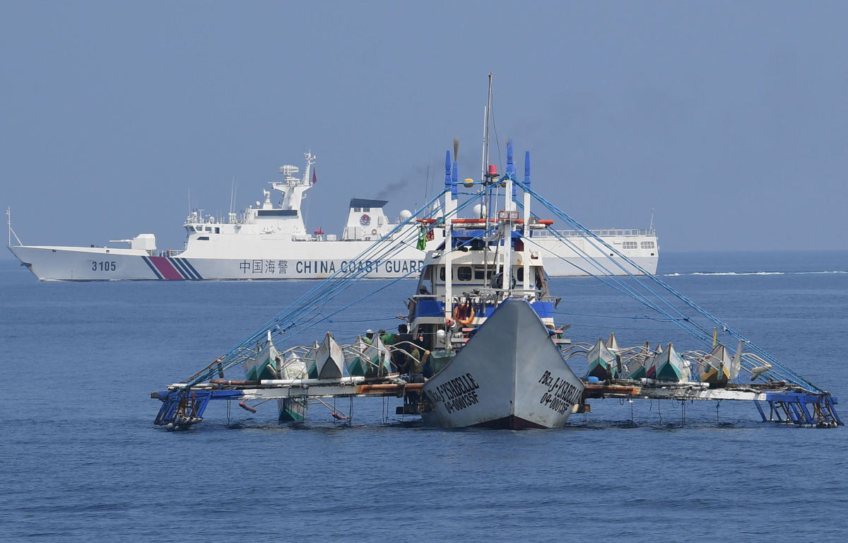 Chased-away Filipino Fisherman Navigates Dangerous Waters Around Chinese Coast Guard Ship