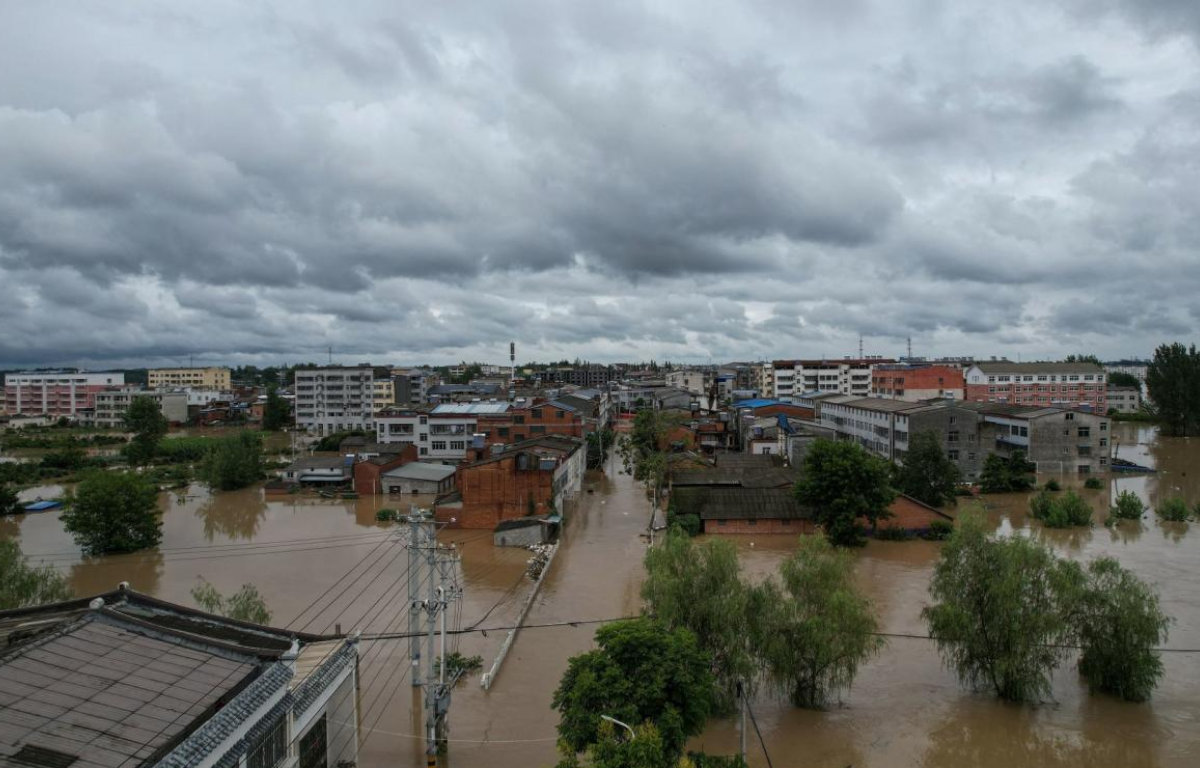 The Chinese Government's Controversial Flooding Strategy in Certain Towns and Neighborhoods